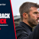 Michael Carrick applauds Old Trafford supporters after Manchester United’s defeat to Bournemouth, alongside the words Fans Back Carrick.