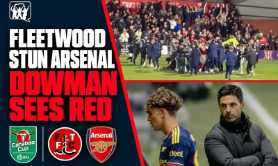 Fleetwood supporters celebrate on the pitch as Max Dowman walks past Mikel Arteta after his red card